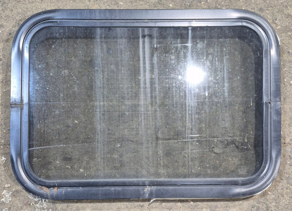 Used Black Radius Non Opening Window : 24 1/4" W x 16 3/4" H x 1 7/8"