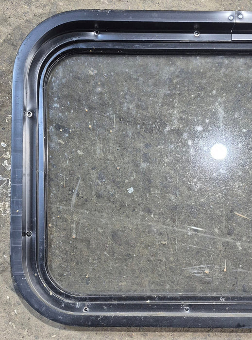 Used Black Radius Non Opening Window : 24 1/4" W x 16 3/4" H x 1 7/8"