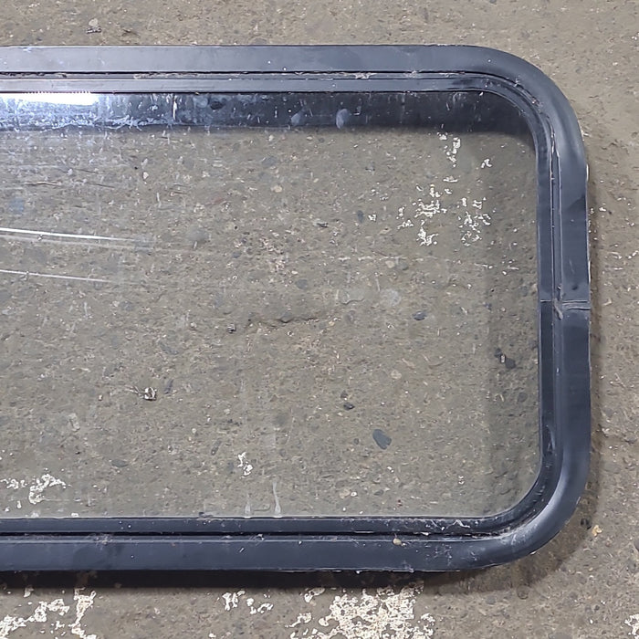 Used Black Radius Non Opening Window : 24 1/4" W x 16 3/4" H x 1 7/8" D