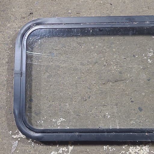 Used Black Radius Non Opening Window : 24 1/4" W x 16 3/4" H x 1 7/8" D - Young Farts RV Parts