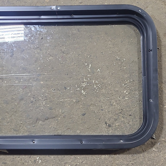 Used Black Radius Non Opening Window : 24 1/4" W x 16 3/4" H x 1 7/8" D - Young Farts RV Parts