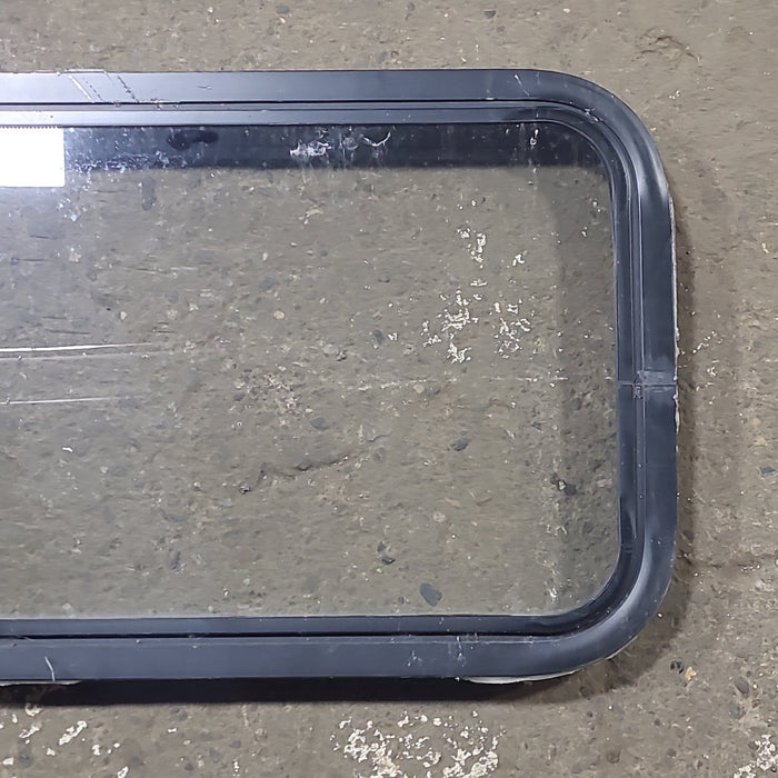 Used Black Radius Non Opening Window : 24 1/4" W x 16 3/4" H x 1 7/8" D