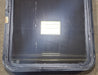 Used Black Radius Non Opening Window : 24" W x 35 1/2" H x 2" D - Young Farts RV Parts