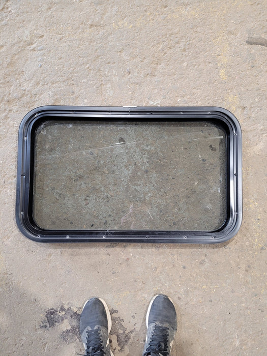 Used Black Radius Non Opening Window : 29 1/2" W x 17 1/2" H x 1 7/8" D - Young Farts RV Parts