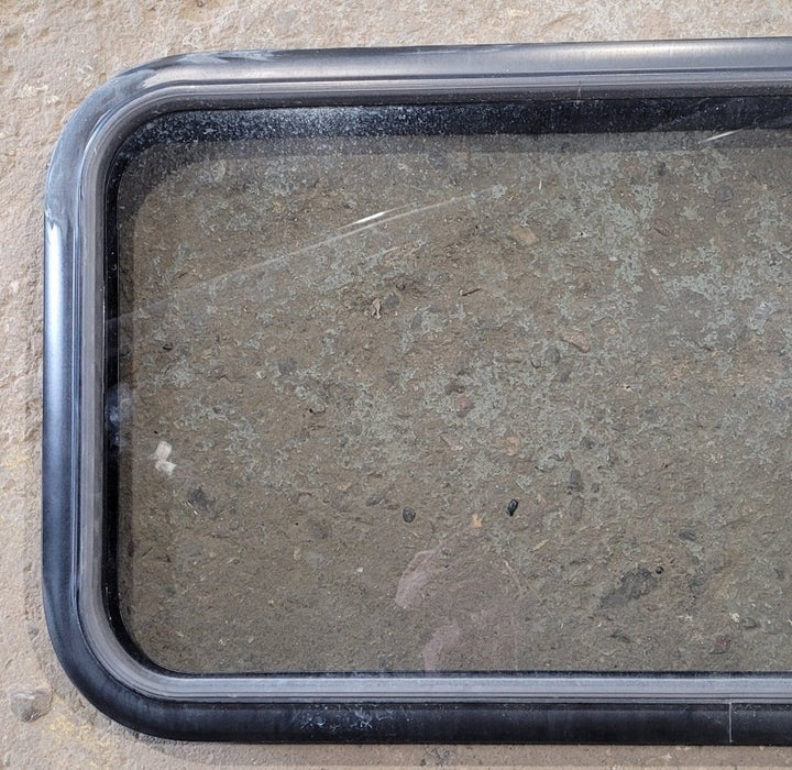Used Black Radius Non Opening Window : 29 1/2" W x 17 1/2" H x 1 7/8" D