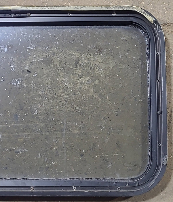 Used Black Radius Non Opening Window : 29 3/4" W x 17 3/4" H x 1 3/4" D - Young Farts RV Parts