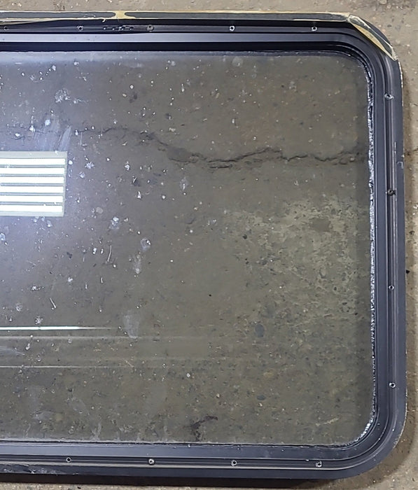 Used Black Radius Non Opening Window : 29 3/4" W x 23 3/4" H x 1 5/8" D - Young Farts RV Parts