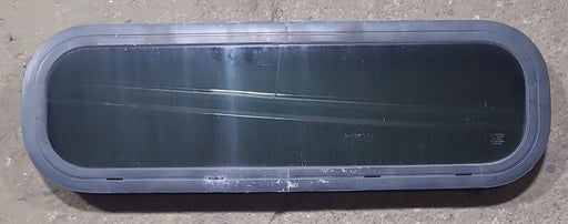 Used Black Radius Non Opening Window : 29 3/8" W x 8 1/2" H x 1 3/4" D - Young Farts RV Parts