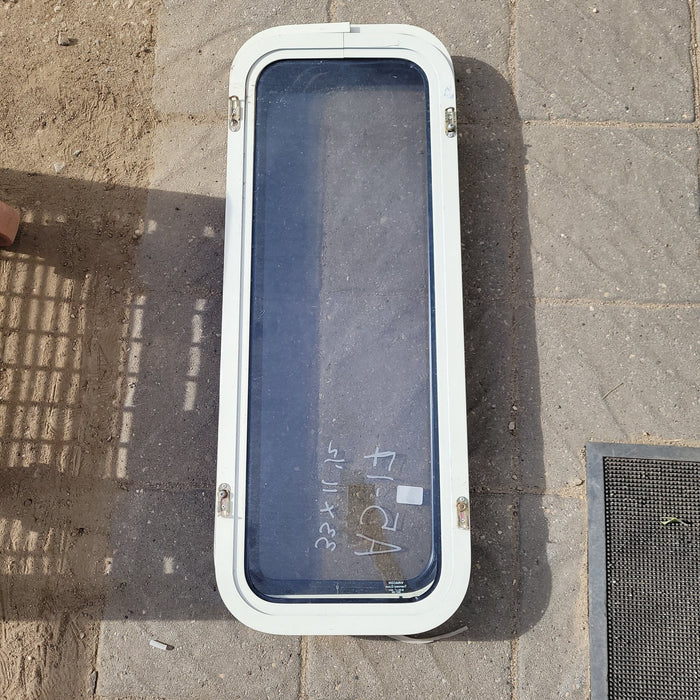 Used Black Radius Non-Opening Window : 33 X 11 1/2 X 2" D