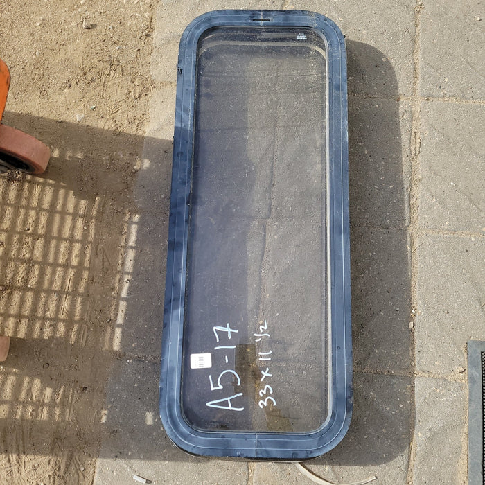 Used Black Radius Non-Opening Window : 33 X 11 1/2 X 2" D