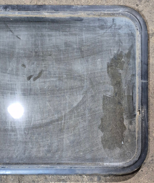 Used Black Radius Non - Opening Window : 34 1/4 x 23 1/4 x 1 1/2" D - Young Farts RV Parts
