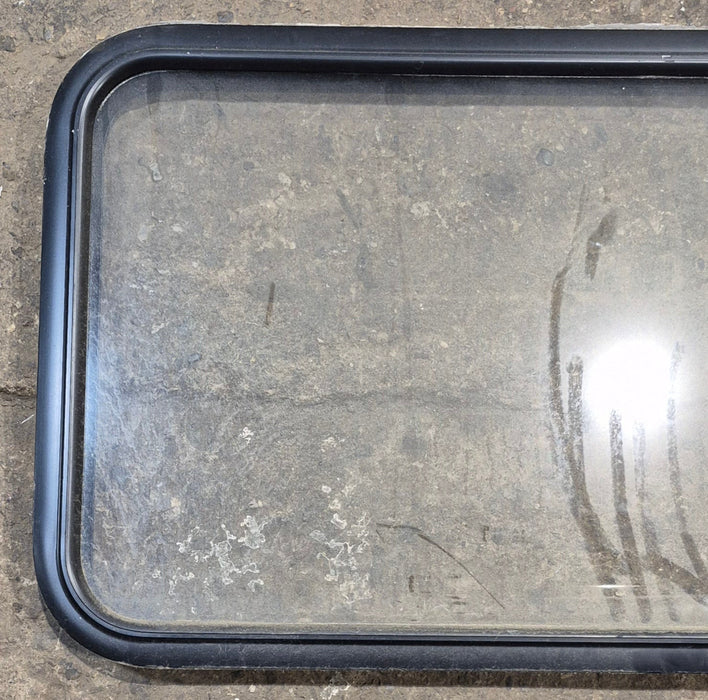 Used Black Radius Non Opening Window : 41 1/2" W x 21 1/2" H x 1 1/2" - Young Farts RV Parts