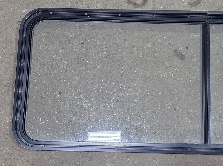 Used Black Radius Non-Opening Window : 60 1/4" W X 21 3/8" H X 1 7/8" D