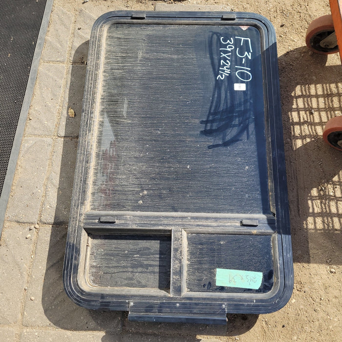 Used Black Radius Opening Storm Window : " D - 38.875 X 24.625 X 1.875