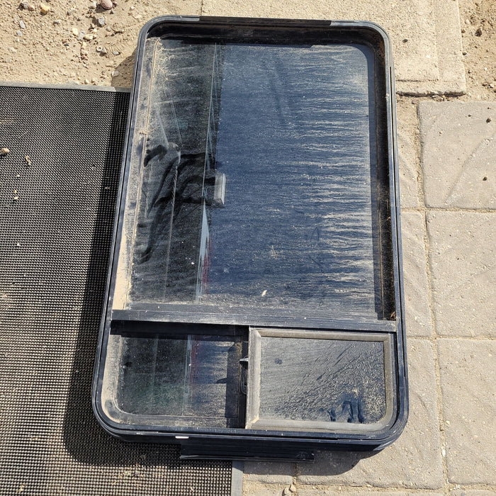 Used Black Radius Opening Storm Window : " D - 38.875 X 24.625 X 1.875