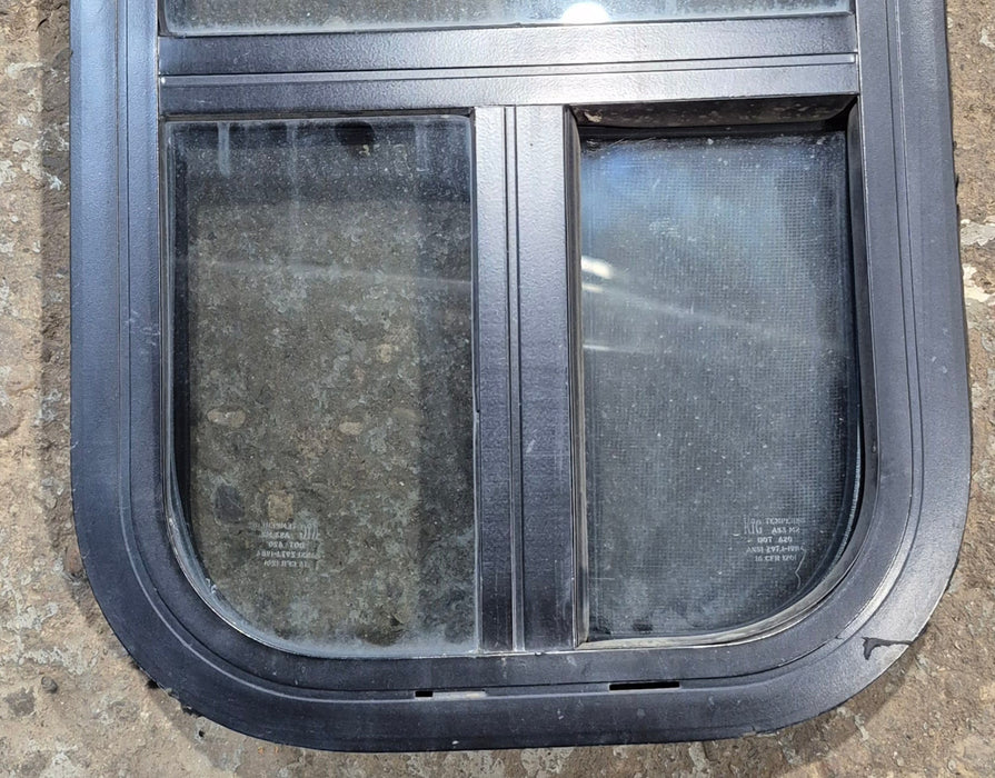 Used Black Radius Opening Window : 11 1/2" W x 21 1/4" H x 1 3/4" D