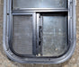Used Black Radius Opening Window : 11 1/2" W x 21 1/4" H x 1 3/4" D - Young Farts RV Parts