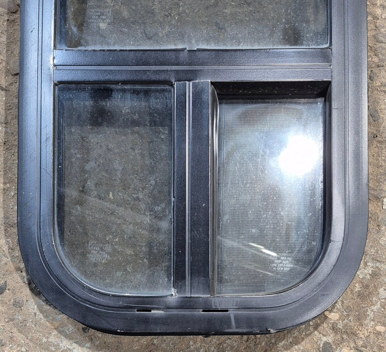 Used Black Radius Opening Window : 11 1/2" W x 21 1/4" H x 1 3/4" D