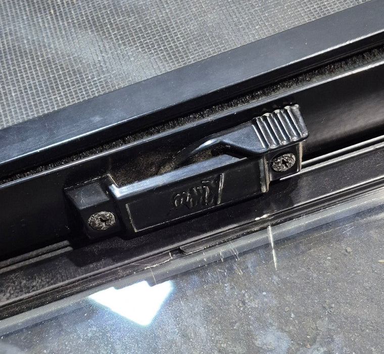 Used Black Radius Opening Window : 11 1/2" W x 21 1/4" H x 1 3/4" D - Young Farts RV Parts