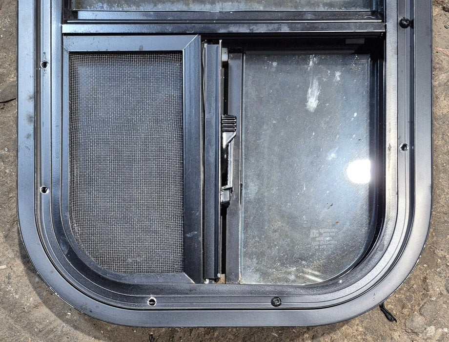 Used Black Radius Opening Window : 11 1/2" W x 21 1/4" H x 1 3/4" D - Young Farts RV Parts
