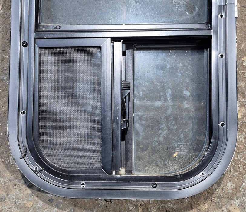 Used Black Radius Opening Window : 11 1/2" W x 21 1/4" H x 1 3/4" D - Young Farts RV Parts