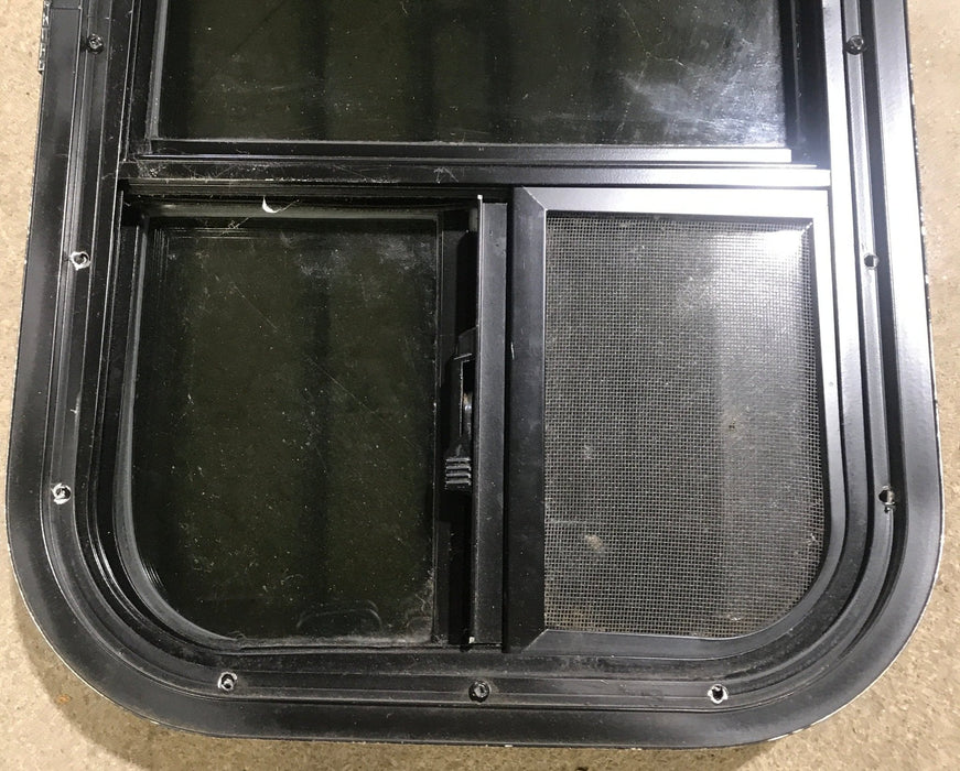 Used Black Radius Opening Window : 13 1/2" W x 25 1/2" H x 1 7/8" D - Young Farts RV Parts