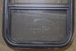 Used Black Radius Opening Window : 17 1/2" W x 21 1/2" H x 1 3/4" D - Young Farts RV Parts