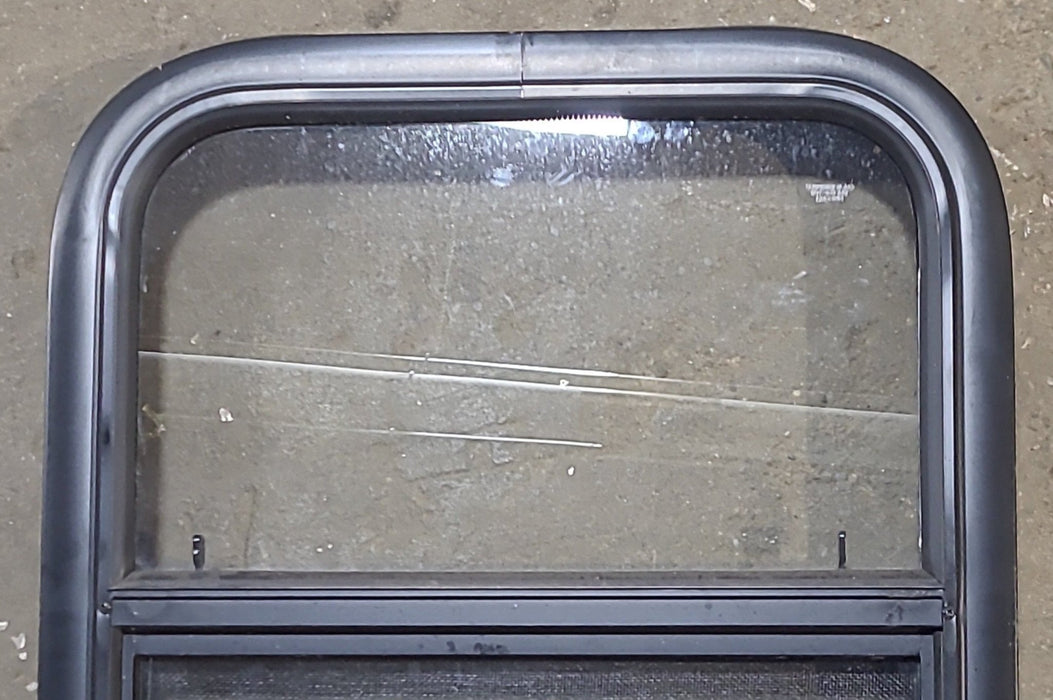 Used Black Radius Opening Window : 17 1/2" W x 21 1/2" H x 1 3/4" D - Young Farts RV Parts