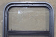 Used Black Radius Opening Window : 17 1/2" W x 21 1/2" H x 1 3/4" D - Young Farts RV Parts