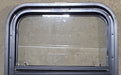 Used Black Radius Opening Window : 17 1/2" W x 21 1/2" H x 1 3/4" D - Young Farts RV Parts