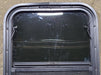 Used Black Radius Opening Window : 17 1/2" W x 21 1/2" H x 1 5/8" D - Young Farts RV Parts