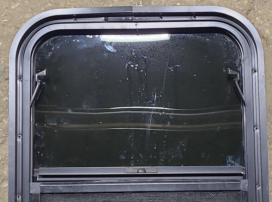 Used Black Radius Opening Window : 17 1/2" W x 21 1/2" H x 1 5/8" D