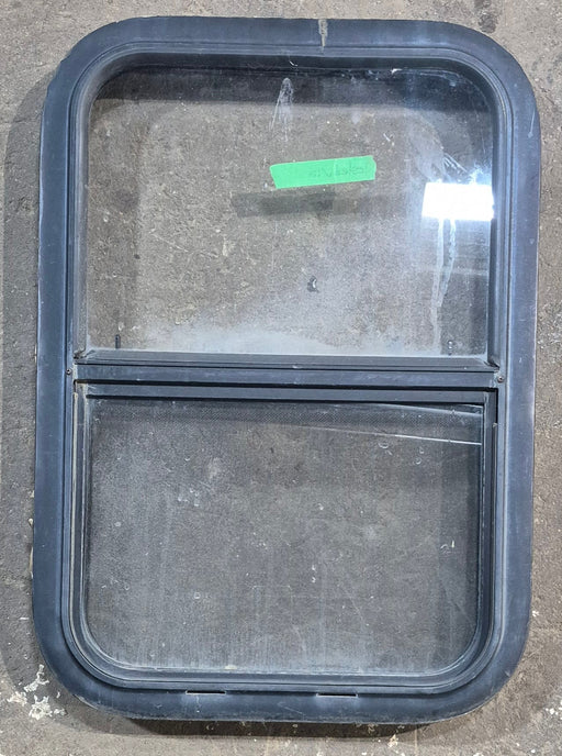 Used Black Radius Opening Window : 17 1/2" W x 25 1/4" H x 1 7/8" D - Young Farts RV Parts