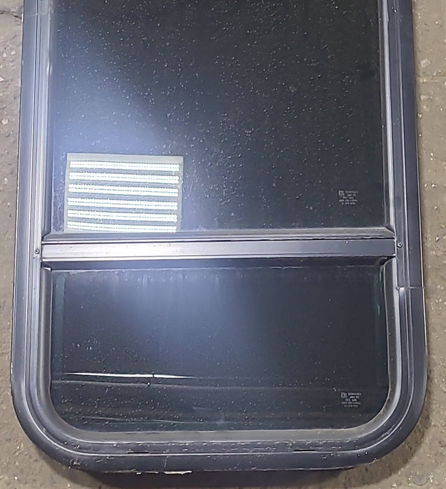 Used Black Radius Opening Window : 17 1/2" W x 35 1/2" H x 2" D