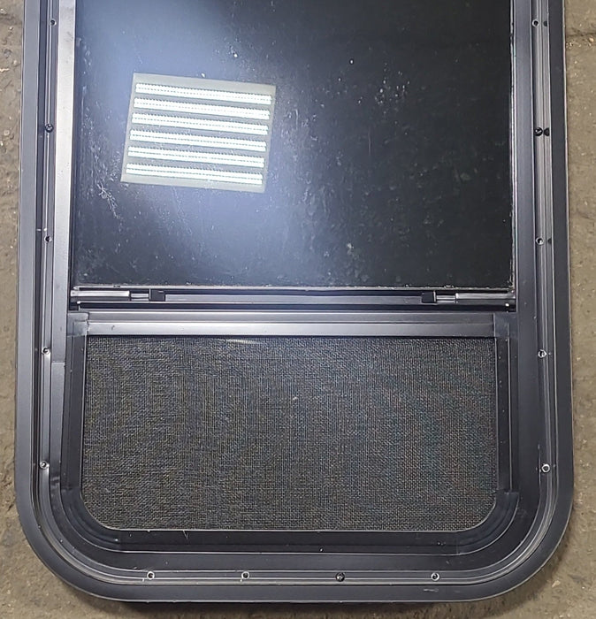Used Black Radius Opening Window : 17 1/2" W x 35 1/2" H x 2" D