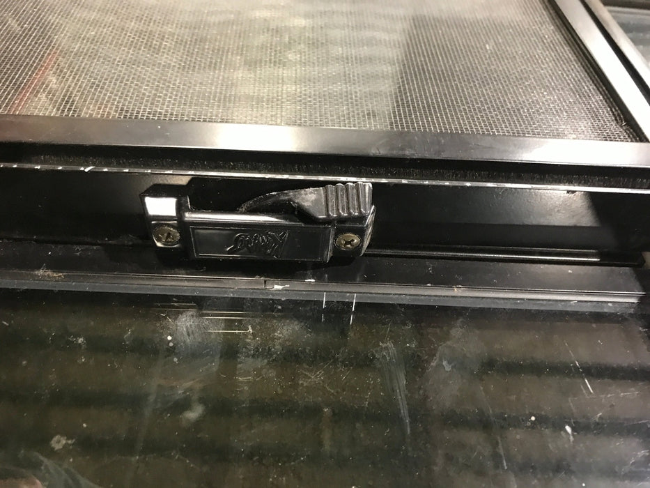 Used Black Radius Opening Window : 17 1/2" W x 39 1/2" H x 1 7/8" D