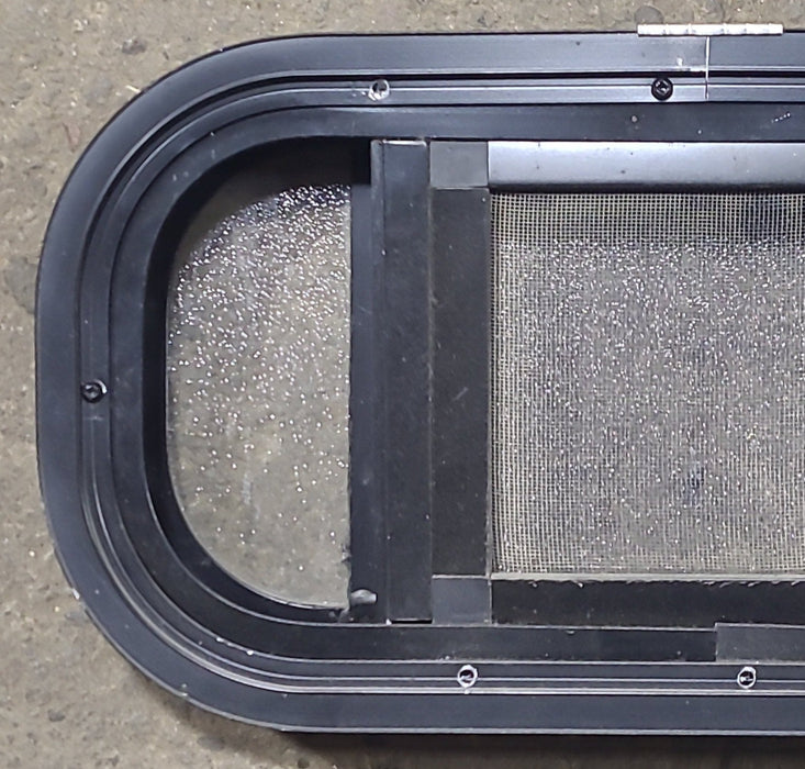 Used Black Radius Opening Window : 17 1/2" W x 8 1/2" H x 1 3/4" D