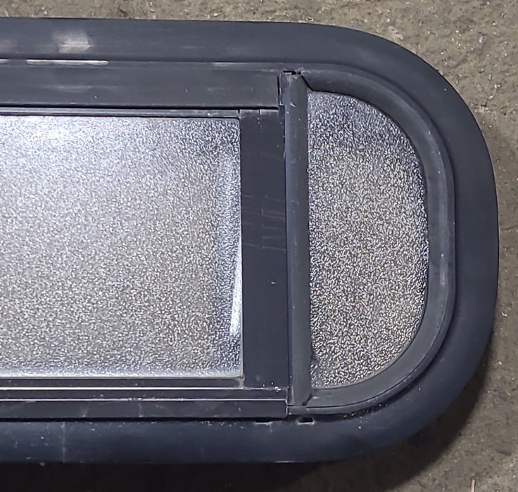 Used Black Radius Opening Window : 17 1/2" W x 8 1/2" H x 1 3/4" D