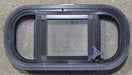 Used Black Radius Opening Window : 17 1/2" W x 8 1/2" H x 1 3/4" D - Young Farts RV Parts