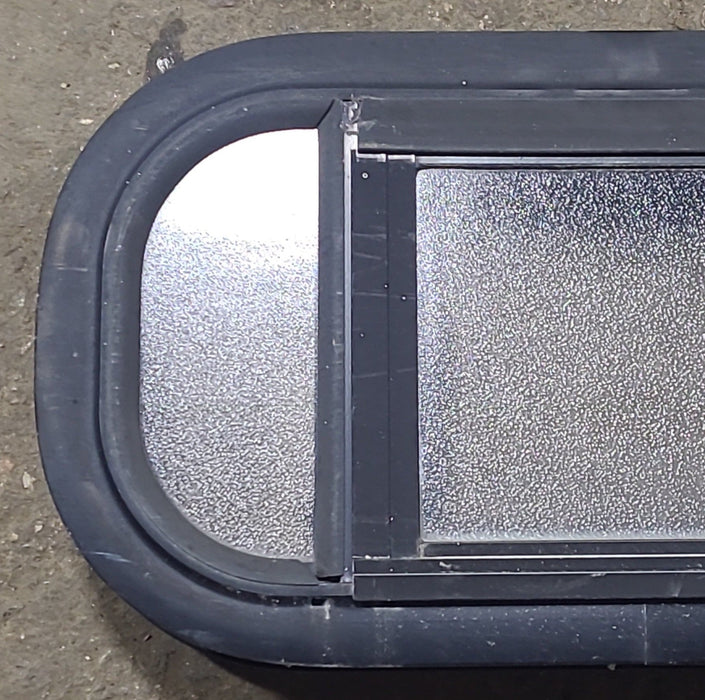 Used Black Radius Opening Window : 17 1/2" W x 8 1/2" H x 1 3/4" D