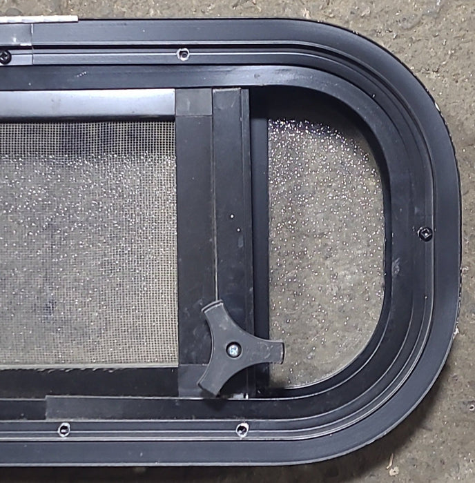 Used Black Radius Opening Window : 17 1/2" W x 8 1/2" H x 1 3/4" D