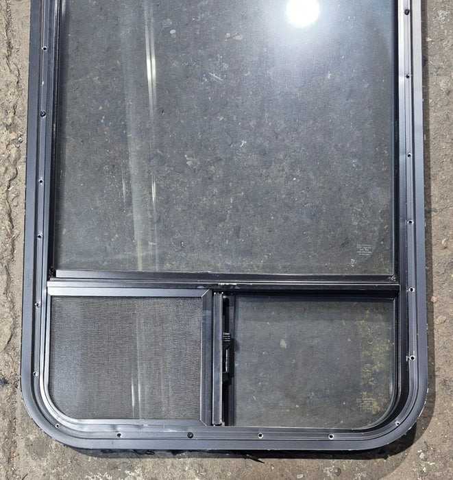 Used Black Radius Opening Window : 21 1/4" W x 47 1/4" H x 1 3/4" D - Young Farts RV Parts