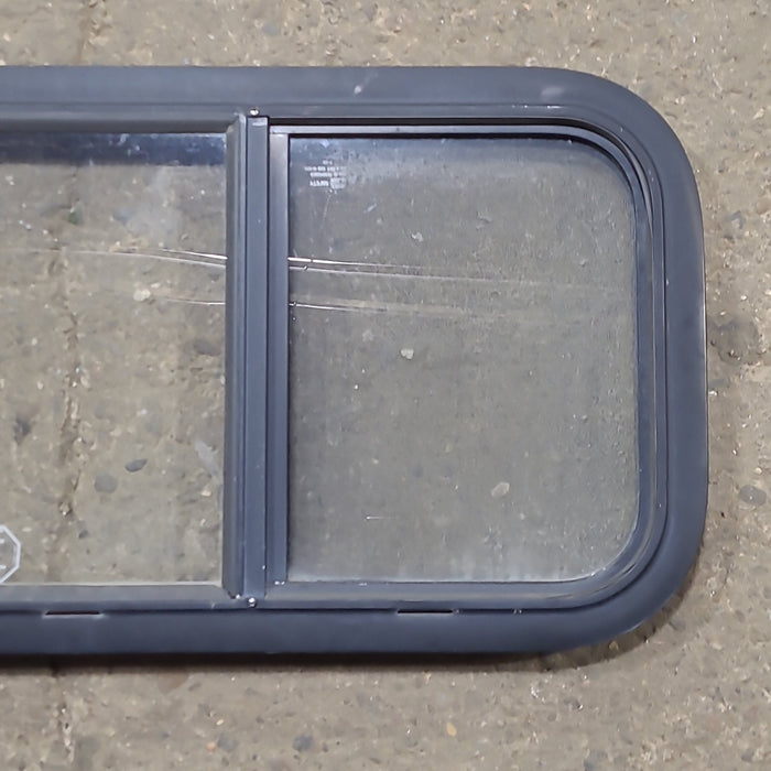 Used Black Radius Opening Window : 23 1/2" W x 14 1/2" H x 1 1/4" D