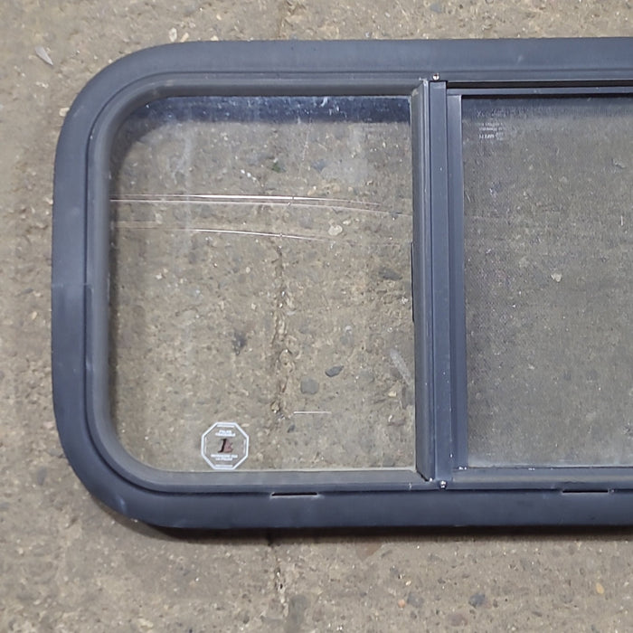 Used Black Radius Opening Window : 23 1/2" W x 14 1/2" H x 1 1/4" D