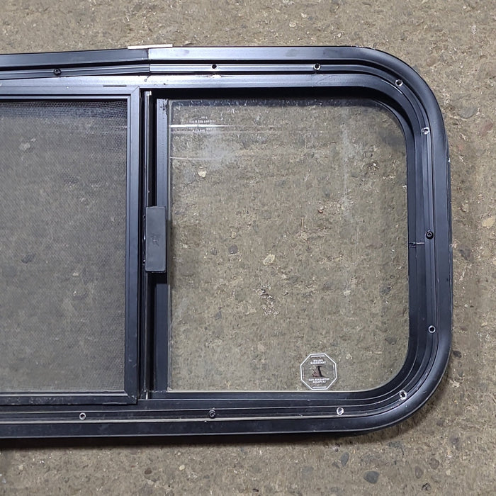 Used Black Radius Opening Window : 23 1/2" W x 14 1/2" H x 1 1/4" D