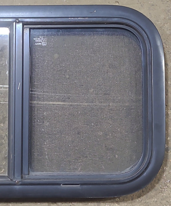 Used Black Radius Opening Window : 23 1/2" W x 14 1/2" H x 1 1/8" D