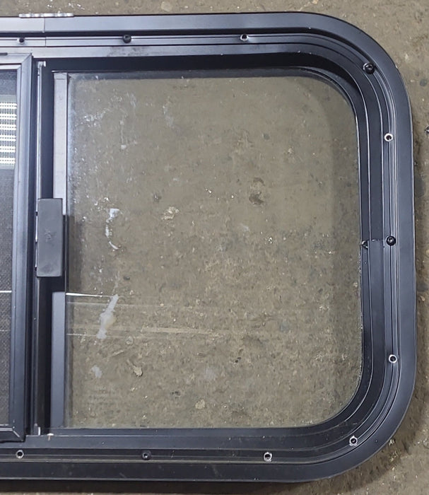 Used Black Radius Opening Window : 23 1/2" W x 14 1/2" H x 1 1/8" D