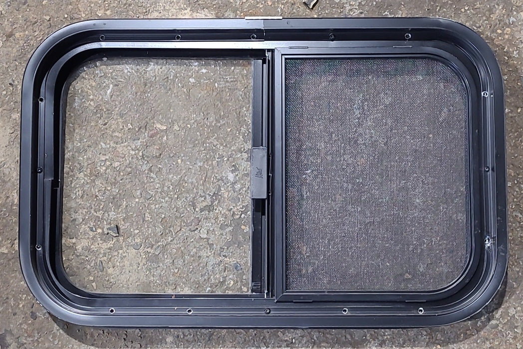 Used Black Radius Opening Window : 23 1/2" W x 14 1/2" H x 1 3/4" D