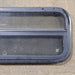 Used Black Radius Opening Window : 23 1/2" W x 14 1/2" H x 1 3/4" D - Young Farts RV Parts