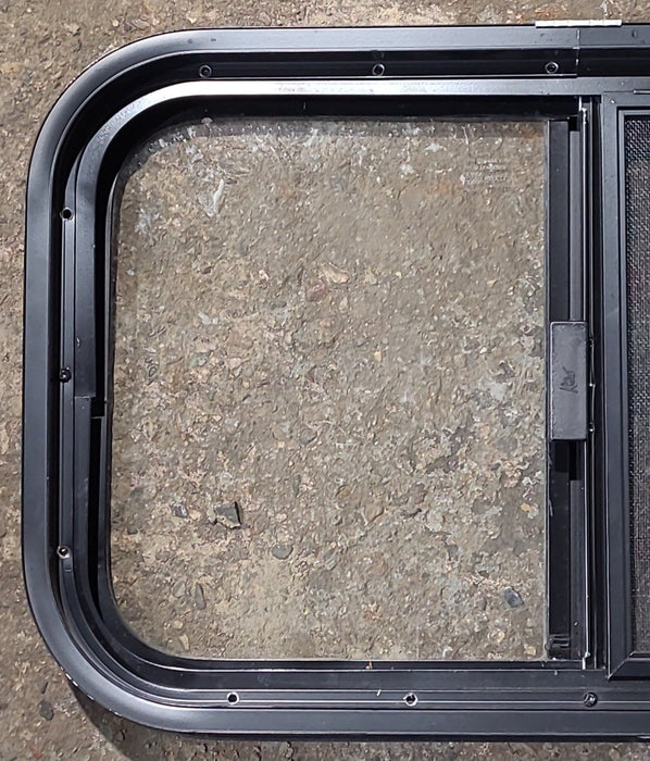 Used Black Radius Opening Window : 23 1/2" W x 14 1/2" H x 1 3/4" D